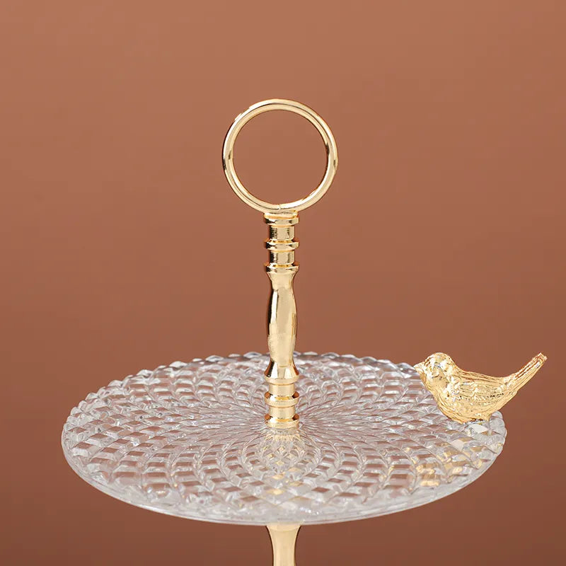 Two-Tier Glass Serving Stand with Gold Handle and Bird Accent