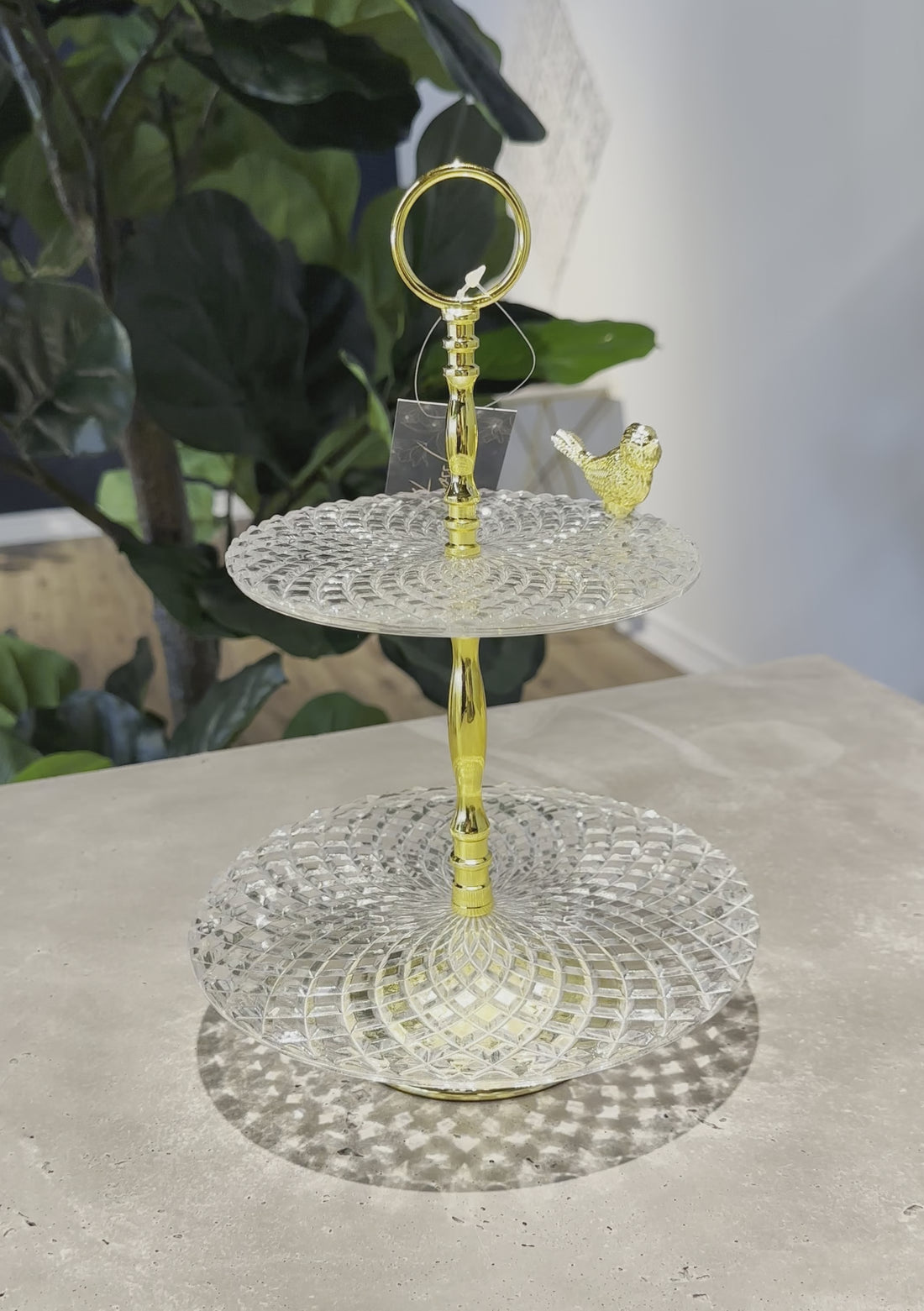 Two-Tier Glass Serving Stand with Gold Handle and Bird Accent